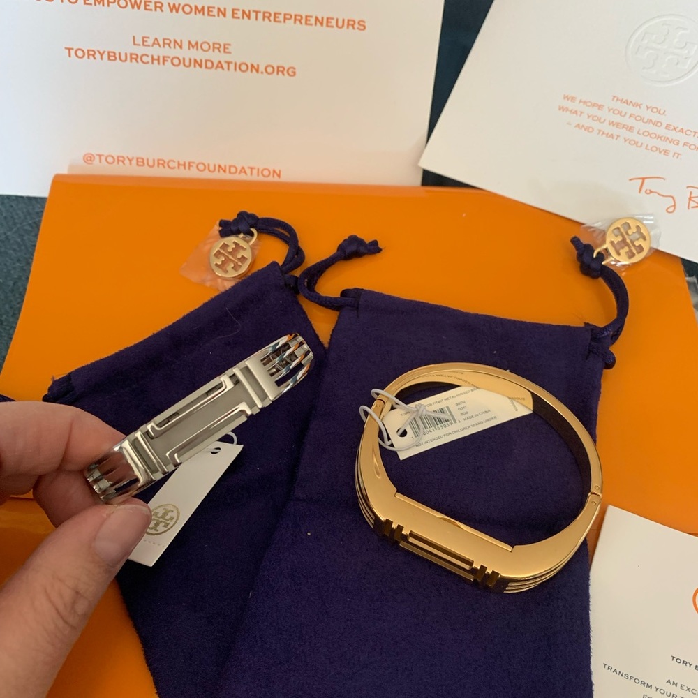 Tory Burch Fitbit covers- one silver and one gold. Brand new, never used.